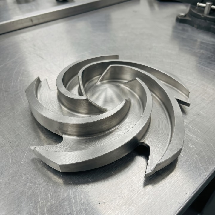 Finished CNC-machined 316L stainless steel replacement impeller ready for install
